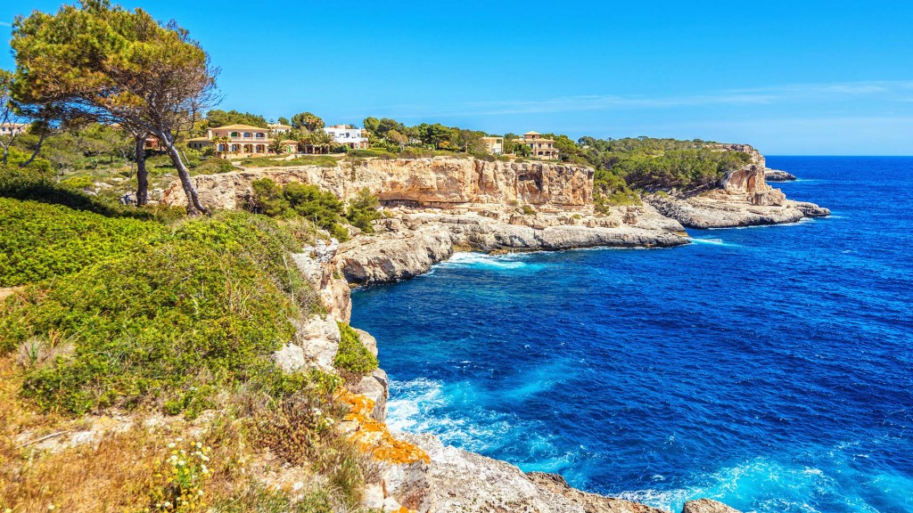 luxury-yacht-charter-spain-cove Rugged cove on luxury yacht charter Spain